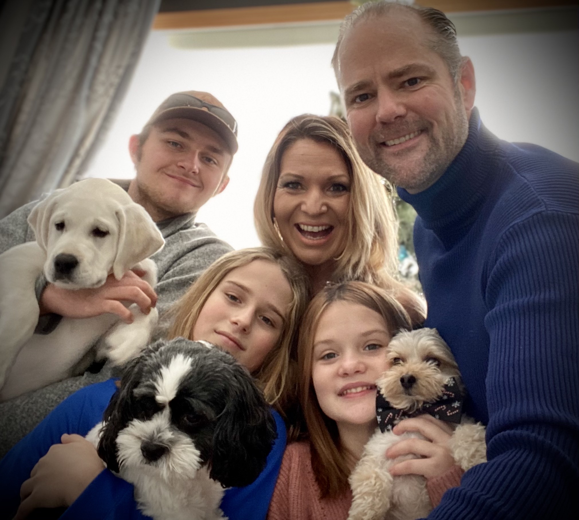 Dr. Hugh Wegwerth and family smiling together with their dogs – chiropractic and functional medicine care in Farmington and Lakeville, Minnesota